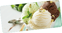 Colorful ive cream scoops in white bowl, copy space